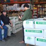 Dr. Duren with Harris at Kiperts with LMF Feeds®